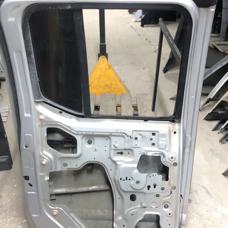 Usa stanga spate / Nissan Navara D40 2006 / Caroserie, oglinzi si faruri