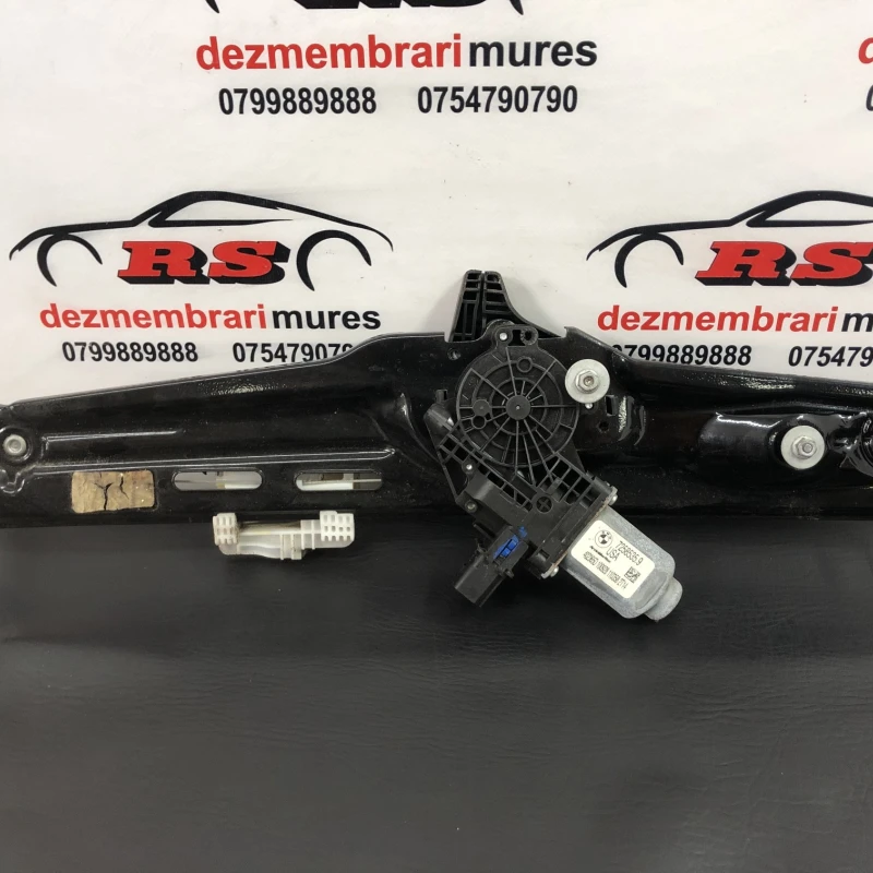Macara geam stanga spate BMW 