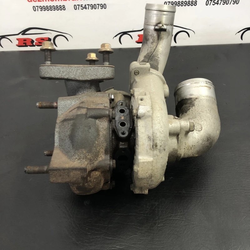 Turbosuflanta turbo turbina / Nissan Navara D40 2006 / Motor, racire si evacuare