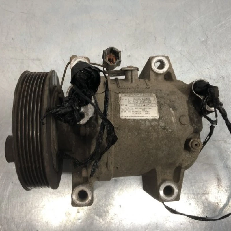 Compresor clima Nissan 